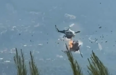 Two firefighting helicopters collide mid-air battling wildfire (see video)