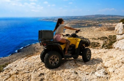 The quad bike continued over the edge and sank in the sea. Image is AI
