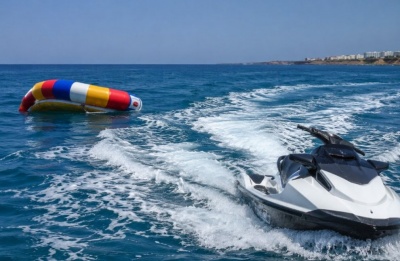 Five-member family was riding an inflatable when it was struck by a rented jet ski. Image is AI