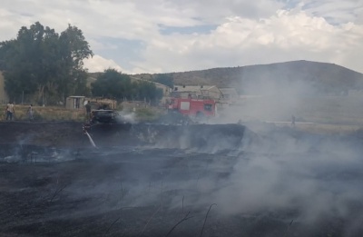 Dozens of firefighters, aircraft and heavy machinery were deployed as crews worked to protect the community. Photo is screen captured from @DepartmentOfForests Facebook video