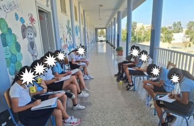 Archival photo of Cypriot public school students holding lessons outside the classroom last year due to the intense heat.