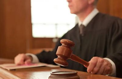 The suspect will remain in custody until October 14, when he and four others are due to face trial before the Criminal Court. Photo credit: Unsplash